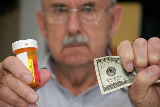 upset man because he's paying too much money for prescription drugs