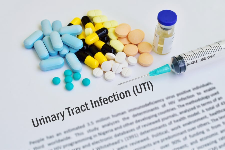 Prescription Pills laying on top of a paper that says Urinary Tract Infection